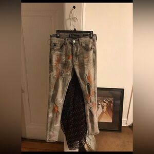 Mens “Switch Remarkable” Jeans in orange with paint defects